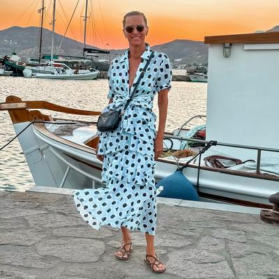 Andrea at a harbor at sunset