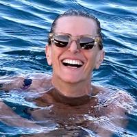 Andrea laughing in the sea
